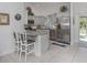 Modern kitchen with stainless steel appliances and granite countertops at 4251 Oak Terrace Cir, Port Charlotte, FL 33953