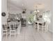 Modern kitchen with stainless steel appliances and breakfast nook at 4251 Oak Terrace Cir, Port Charlotte, FL 33953