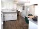 Open kitchen with breakfast nook and view into living room at 426 Boxwood Dr, Venice, FL 34285