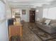 Spacious living room with hardwood floors and ample natural light at 426 Boxwood Dr, Venice, FL 34285