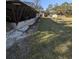 Large backyard with a walkway and landscaping at 451 Home Park Rd, Venice, FL 34285