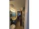 Bathroom with a single vanity, shower, and access to bedroom at 451 Home Park Rd, Venice, FL 34285