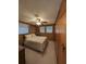 Bedroom with a queen-size bed and ample closet space at 451 Home Park Rd, Venice, FL 34285
