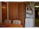 Small dining area with table and chairs, adjacent to kitchen at 451 Home Park Rd, Venice, FL 34285