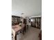 Bright dining room with table and hutch at 451 Home Park Rd, Venice, FL 34285