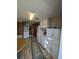 Laundry room with washer, dryer, and extra storage cabinets at 451 Home Park Rd, Venice, FL 34285