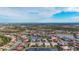 Aerial view of a large community with houses and lakes at 4621 Gaeta Dr, Venice, FL 34293