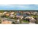 Aerial view of a luxury community with lakefront homes at 4621 Gaeta Dr, Venice, FL 34293