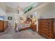 Spacious bedroom with high ceilings and wood furniture at 4621 Gaeta Dr, Venice, FL 34293