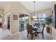 Casual breakfast nook with glass table and wicker chairs, near the pool at 4621 Gaeta Dr, Venice, FL 34293