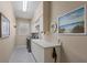 Bright laundry room with ample counter and cabinet space at 4621 Gaeta Dr, Venice, FL 34293
