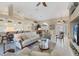 Open concept living room with a view of the kitchen and dining area at 4621 Gaeta Dr, Venice, FL 34293