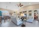 Bright and airy living room with a view of the dining area and bedroom at 4621 Gaeta Dr, Venice, FL 34293
