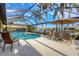 Inviting pool and patio area with screened enclosure at 4621 Gaeta Dr, Venice, FL 34293
