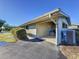 Covered carport with additional storage space at 500 Park S Blvd # 7, Venice, FL 34285