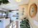 Bright white kitchen with island and stainless steel appliances at 500 Park S Blvd # 7, Venice, FL 34285
