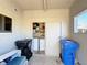 Shared laundry area with washer, dryer, and storage at 500 Park S Blvd # 7, Venice, FL 34285