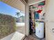 Small laundry room with washer, dryer, and storage at 500 Park S Blvd # 7, Venice, FL 34285
