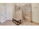 Bathroom featuring a glass enclosed shower with built in bench at 522 Fallbrook Dr, Venice, FL 34292