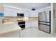 Well-equipped kitchen with stainless steel appliances and ample counter space at 523 Park Estates Sq, Venice, FL 34293