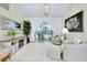 Cozy living room boasts stylish furnishings, a modern entertainment center, and natural light at 523 Park Estates Sq, Venice, FL 34293