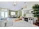 Open living room and dining area with high ceilings and lots of natural light at 523 Park Estates Sq, Venice, FL 34293