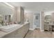 Modern bathroom with double sinks and ample storage at 550 W Flamingo # 401, Venice, FL 34285