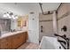 Bathroom with soaking tub, tiled shower, and updated fixtures at 550 W Flamingo # 401, Venice, FL 34285