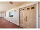 Condo building entrance with tiled flooring and access to unit 401 at 550 W Flamingo # 401, Venice, FL 34285