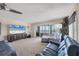 Living room with ocean view, comfortable seating and large TV at 550 W Flamingo # 401, Venice, FL 34285