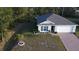 Aerial view of a single-story house with a garage at 5550 Eyerly Ter, Port Charlotte, FL 33981