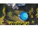 Aerial view showing a house with a backyard pool at 5550 Eyerly Ter, Port Charlotte, FL 33981