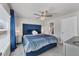 Spacious bedroom with a large bed, window, and en-suite bathroom at 5550 Eyerly Ter, Port Charlotte, FL 33981