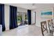 Bright dining area with sliding glass doors leading to the backyard at 5550 Eyerly Ter, Port Charlotte, FL 33981