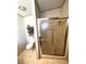 Bathroom with toilet and a shower stall at 563 Portside Dr, North Port, FL 34287