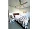 Bedroom with a full-size bed and side tables at 563 Portside Dr, North Port, FL 34287