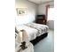 Bedroom with a queen-size bed and a TV at 563 Portside Dr, North Port, FL 34287