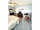Bedroom with a queen-size bed and a workspace at 563 Portside Dr, North Port, FL 34287