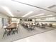 Large community room with tables and chairs for meetings or events at 563 Portside Dr, North Port, FL 34287