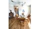 Dining area with glass table and wicker chairs at 563 Portside Dr, North Port, FL 34287