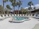 Enjoy the relaxing hot tub surrounded by lounge chairs at 563 Portside Dr, North Port, FL 34287