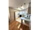Galley-style kitchen with light wood cabinets and appliances at 563 Portside Dr, North Port, FL 34287