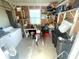 Messy laundry room with washer, dryer and storage at 563 Portside Dr, North Port, FL 34287