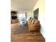 Living room with wicker sofa and glass-top coffee table at 563 Portside Dr, North Port, FL 34287