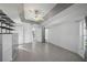 Light and airy bedroom with tiled floors and access to bathroom at 5891 Madison Rd, Venice, FL 34293