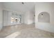 Spacious living room with tile floors and pool access at 5891 Madison Rd, Venice, FL 34293