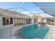 Relaxing screened-in pool with ample deck space at 5891 Madison Rd, Venice, FL 34293