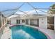 Large screened pool with a spacious patio area at 5891 Madison Rd, Venice, FL 34293