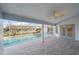 Screened pool and patio area with tile floors at 5891 Madison Rd, Venice, FL 34293