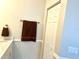 Bathroom with a linen closet and a large vanity at 6 Pinehurst Rd, Rotonda West, FL 33947